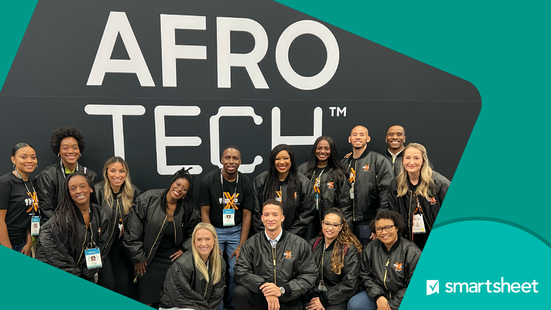 Group of people smiling at Afro Tech conference